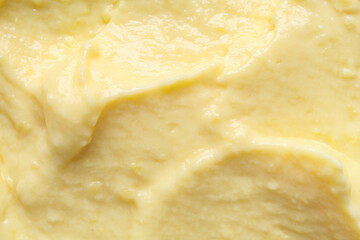 Texture of tasty vanilla pudding as background, closeup, closeup