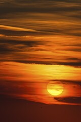 Glowing sun, sunset with clouds, evening sky, Germany, Europe