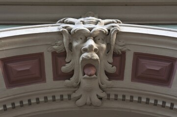 Grotesque on an entranceway, Munich, Bavaria, Germany, Europe