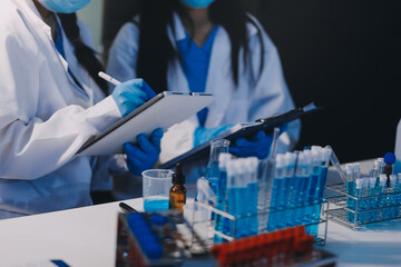 Microbiological research with a test tube and micropipette in close -up