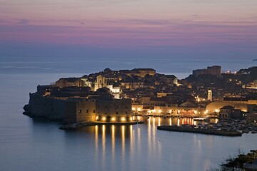 Panoramic view of the illuminated old town, dusk, Dubrovnik, Croatia, Europe