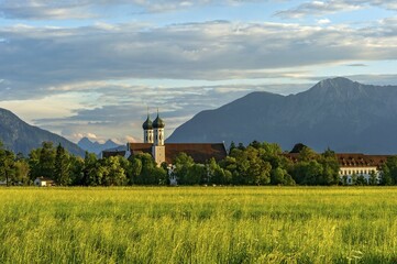 Basilica of St Benedict, Benedictine monastery Benediktbeuern, rear left Jochberg, right...