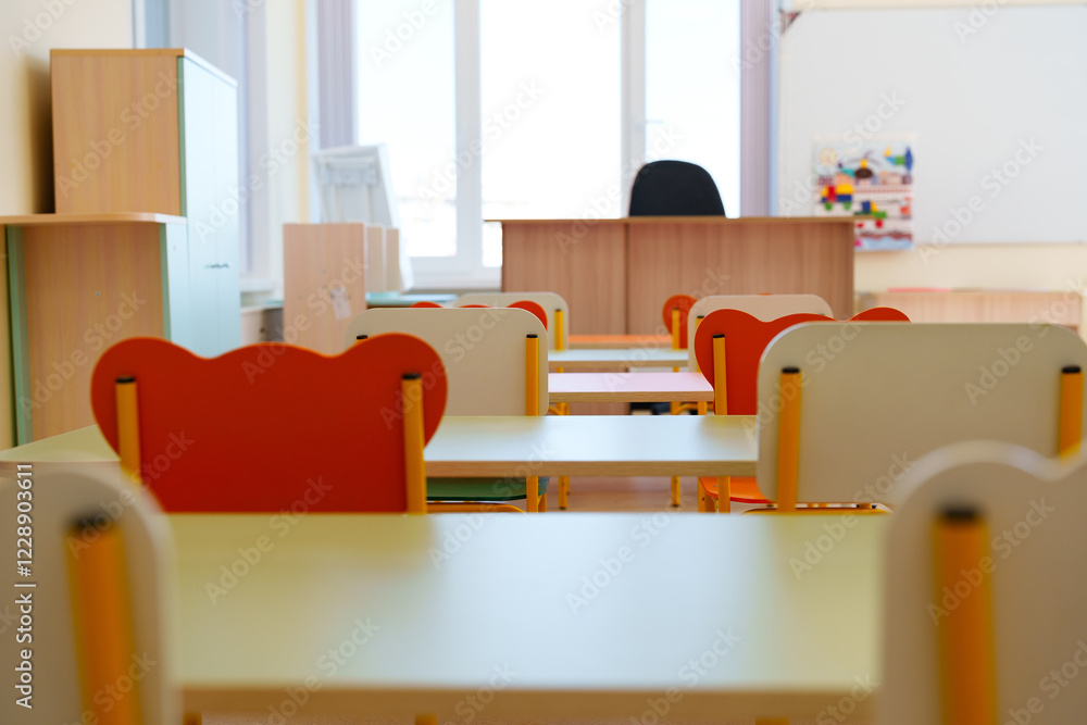 Poster bright and inviting classroom setup with colorful chairs and desks ready for students in a learning 