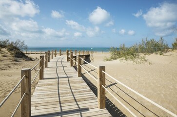 Wooden footbridges at the beach of Riumar, Ebro Delta Nature Reserve, Tarragona province, Catalonia, Spain, Europe