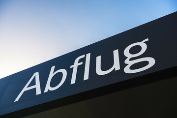 Obraz premium Lettering Abflug at the entrance to Tenerife South Airport Reina Sofia, Tenerife, Canary Islands, Spain, Europe