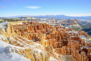 View of the amphitheatre in the morning light, snow-covered bizarre rocky landscape with Hoodoos in...