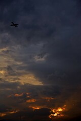 Aircraft in front of cloudy sky at sunset, Bulgaria, Europe
