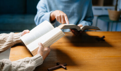 Woman's hand with cross .Concept of hope, faith, christianity, religion, church