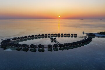 Aerial view, lagoon of the Maldives island Olhuveli with water bungalows, South-Male-Atoll,...