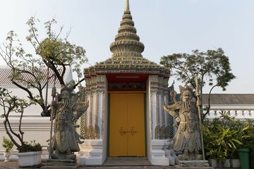 Entrance with Chinese guardian figures, Wat Pho, Buddhist temple complex, Rattanakosin, Bangkok,...