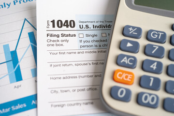 Obraz premium Tax Return form 1040 with pencil and calculator, U.S. Individual Income.