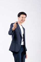 A man in a blue suit and white shirt poses for a photo