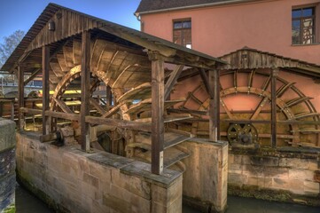 Fototapeta premium Mill wheels of the grinding mill, 1541, Lauf an der Pegnitz, Middle Franconia, Bavaria, Germany, Europe