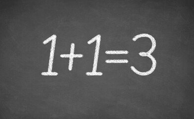 Chalkboard with the words of one plus one equals three. closeup