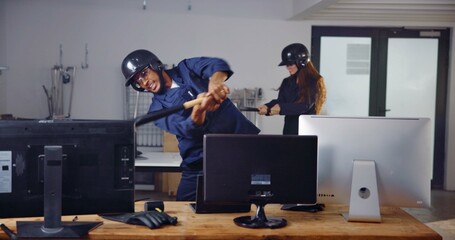Computer, bat and friends in rage room for frustrated, anger management and stress relief. Weapon,...