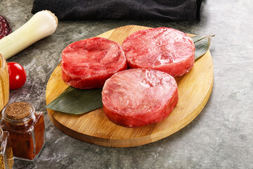 Delicous raw tuna medallion for cooking