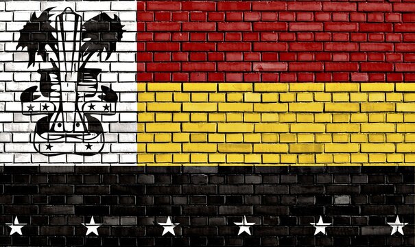 Flag of Madang Province painted on brick wall