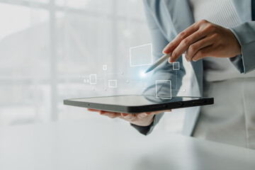 Person with hologram flowchart, businessman designing flowchart business workflow to systematically qualitatively, flowcharting to visualize the workflow of the program. Flowchart design concept.