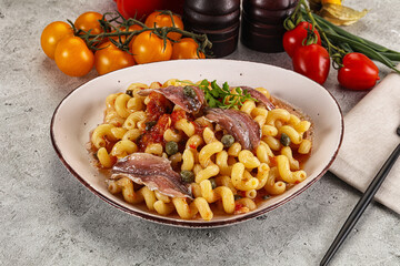 Italian pasta cellentani with anchovy