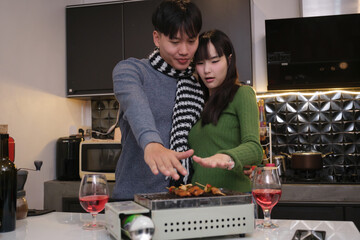 Young Asian couple living at home