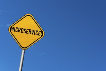 Microservices, yellow sign with blue sky