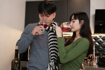 Young Asian couple living at home