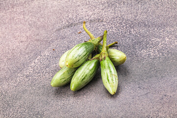 Small organic young green eggplant