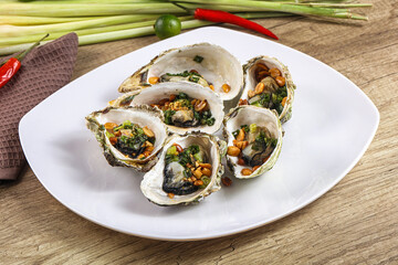 Baked oysters with green onion