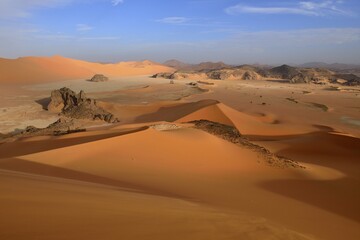 Sanddunes and rock towers at Ouan Zaouatan, Tadrart, Tassili n´ Ajjer National Park, Unesco World Heritage Site, Sahara desert, Algeria, Africa