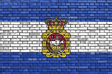 Flag of Aviles painted on brick wall