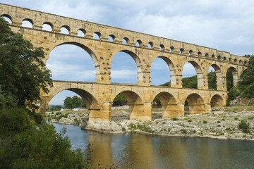 Fototapeta premium Pont du Gard, Roman aqueduct, Languedoc Roussillon region, Unesco World Heritage Site, France, Europe