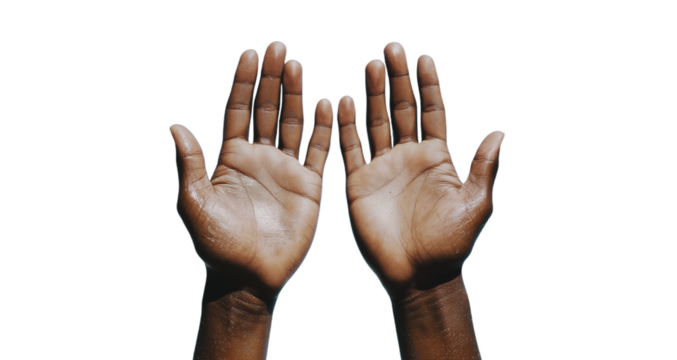 Two open hands raised towards the sky symbolizing connection, hope, and the pursuit of dreams during a bright day