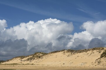 Dune with cumulus clouds (cumulus), Atlantic Coast, La Tranche sur Mer, Vandee, France, Europe