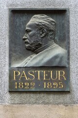 Memorial plaque with the relief of Luis Pasteur, 1822-1895, microbiologist, physicist and chemist, on a house wall, Strasbourg, Alsace, France, Europe