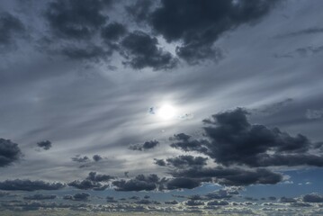 Cloud formations with sun behind a cloud cover, Bavaria, Germany, Europe