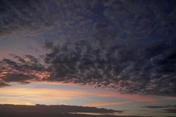 Fototapeta premium Fleecy clouds, altocumulus, in the evening sky, Germany, Europe
