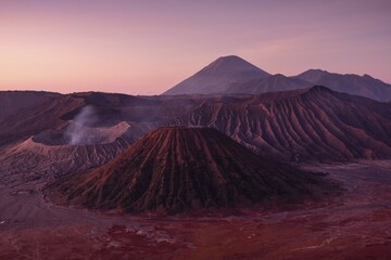 Volcanic pipes with smoking volcano Gunung Bromo, Mt. Batok, Mt. Kursi, Mt. Gunung Semeru, National...