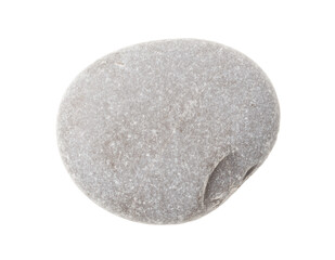 A gray rock with a hole in it