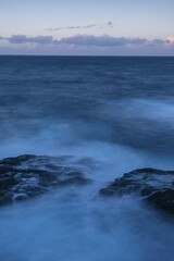 Washed over rocks in the water, waves, long exposure, La Gomera, Canary Island, Spain, Europe