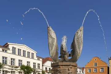 Fish fountain spouting water, Barth, Mecklenburg-Western Pomerania, Germany, Europe