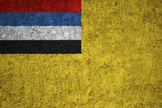 Manchukuo Flag painted on the cracked grunge concrete wall