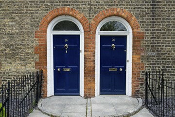 Blue front doors to townhouse, Dublin, Ireland, Europe