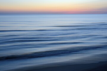 Obraz premium Sunset at the North Sea, Texel, North Holland, Netherlands