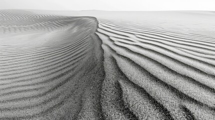 Fototapeta premium Black and white image of sand dunes with deep ripples in a desert, AI generated