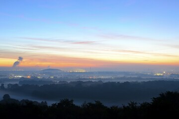 View from the Halde Norddeutschland spoil tip onto the Lower Rhine and the western Ruhr district at dawn, Neukirchen, North Rhine-Westphalia, Germany, Europe