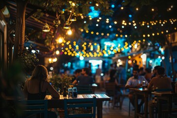 Obraz premium Bokeh background of Street cafe with a garlands, sitting people have a dinner, outdoor, evening. AI generative