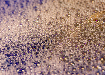 foam bubbles on blue background.