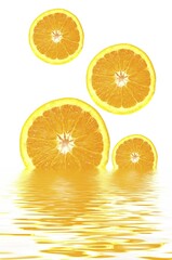 Orange slices with reflections in water