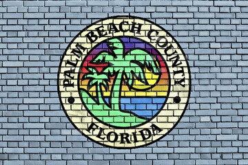 Lag of Palm Beach County painted on brick wall
