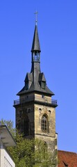 Fototapeta premium West tower or main tower of the Stiftskirche Stuttgart, seen from the market place, Baden-Württemberg, Germany, Europe